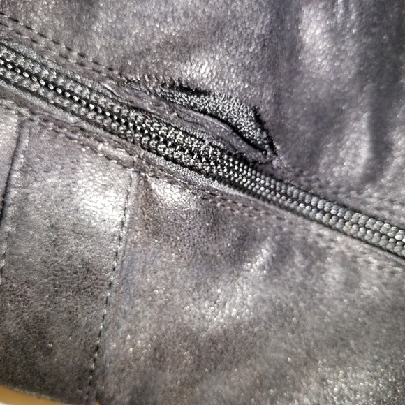 Ladies boot. Size 7.5. Black faux leather. Small tear near zipper. - Picture 6 of 6